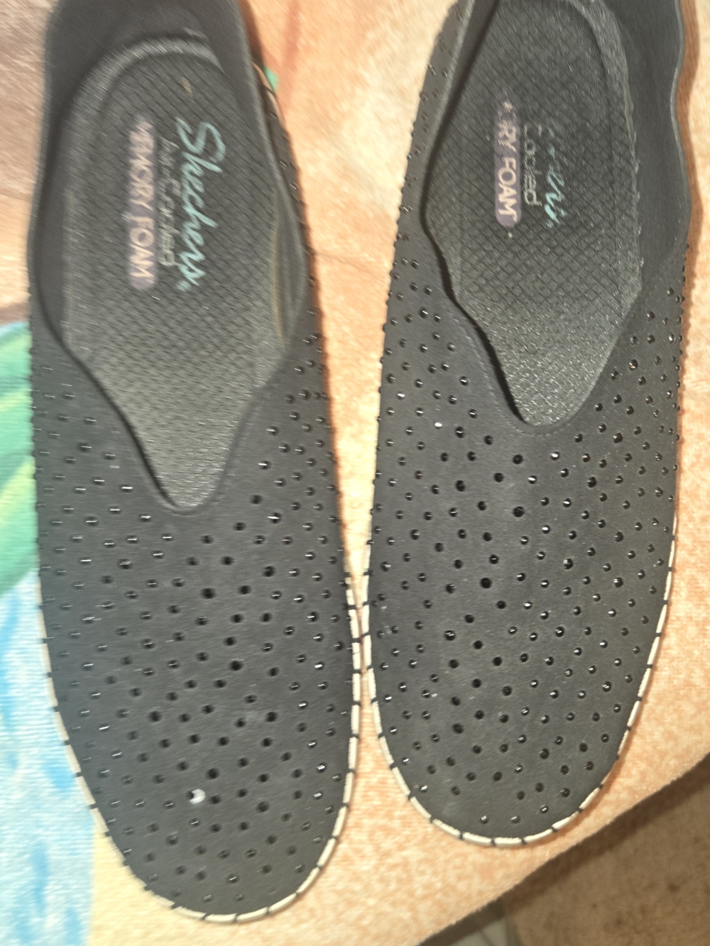Skechers women's Black Perforated Slip-On Memory Foam Loafers